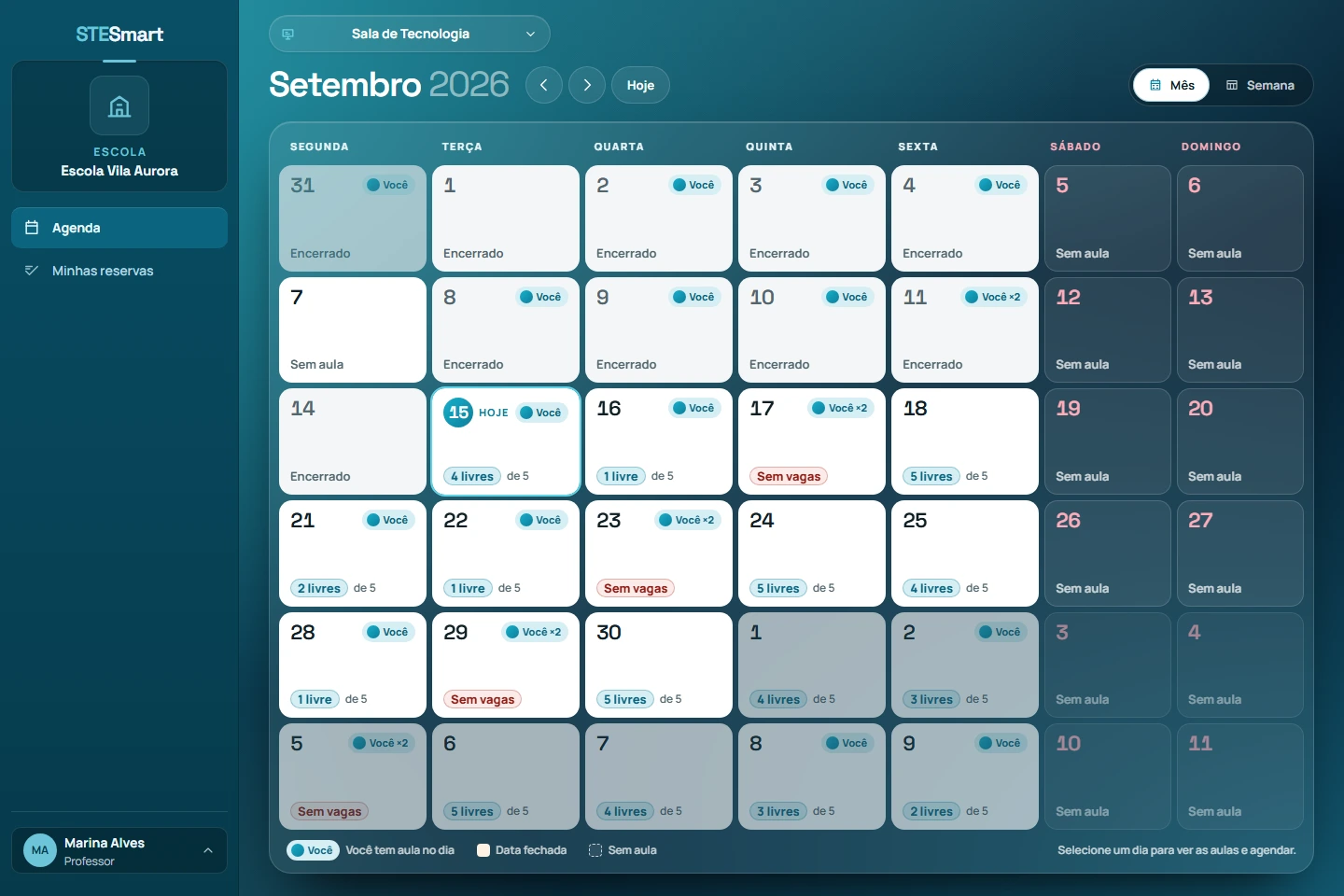 Interface atual do STESmart: agenda mensal da Escola Vila Aurora, com disponibilidade por dia e ambiente.